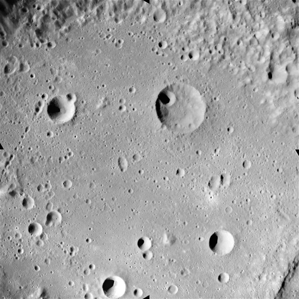 Hans Fischer - The entire frame of this picture is occupied by the interior of the Mendeleev impact basin. Part of the wide inner wall of Mendeleev is visible along the top edge. Near the left side of