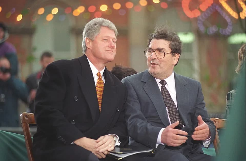 John Hume - Close-up photo of President Clinton and SDLP leader John Hume.