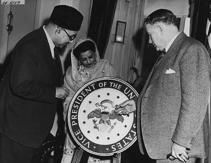 Liaquat Ali Khan - Vice President Alben Barkley explains the 1948 version of the Vice President's seal to Prime Minister Ali Khan of Pakistan and his wife. Pictured left to Right are Prime Minister Al