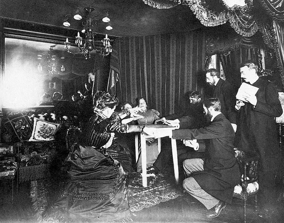 Camille Flammarion - A table levitates in front of witnesses during a séance with medium Eusapia Palladino at the home of astronomer Camille Flammarion in France on November 25, 1898.