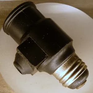 Kōnosuke Matsushita - Two way plug, improved by Konosuke Matsushita.