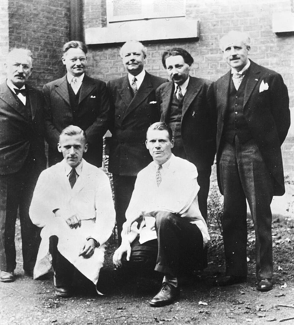Ernst Chain - Group portrait(back row, left to right) Selman Waksman, Howard Florey, Jacques Tréfouël, Ernst Boris Chain, Andre Gratia, (front row left to right) Pierre Fredericq and Maurice Welsch. T