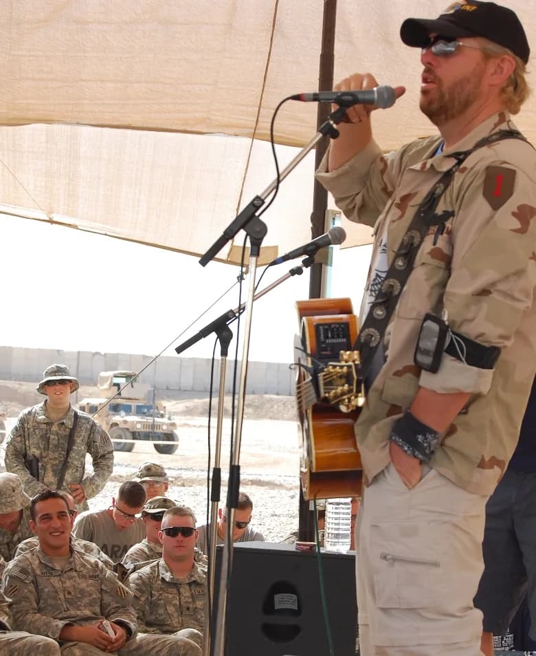 Toby Keith - Toby Keith thanks the Soldiers from the 1-15th Infantry Regiment for their service during an acoustic set played at Combat Outpost Carver, Salman Pak, Iraq, April 26.