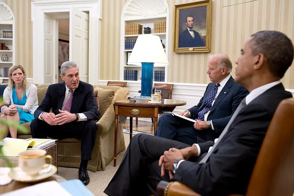 Robert Mueller - President Barack Obama and Vice President Joe Biden meet with senior advisors in the Oval Office to discuss the shootings in Aurora, Colorado, July 20, 2012. Pictured, from left, are: