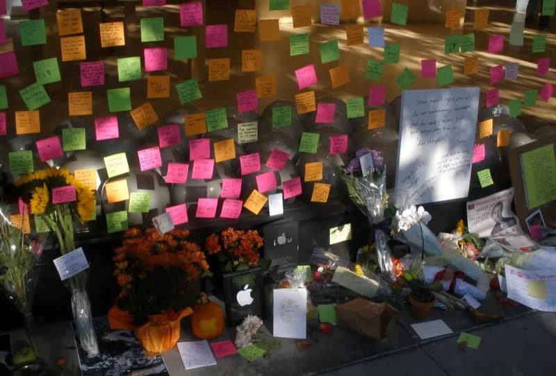Steve Jobs - Tribute to Steve Jobs at the Palo Alto Apple Store. Post-Its and flowers.