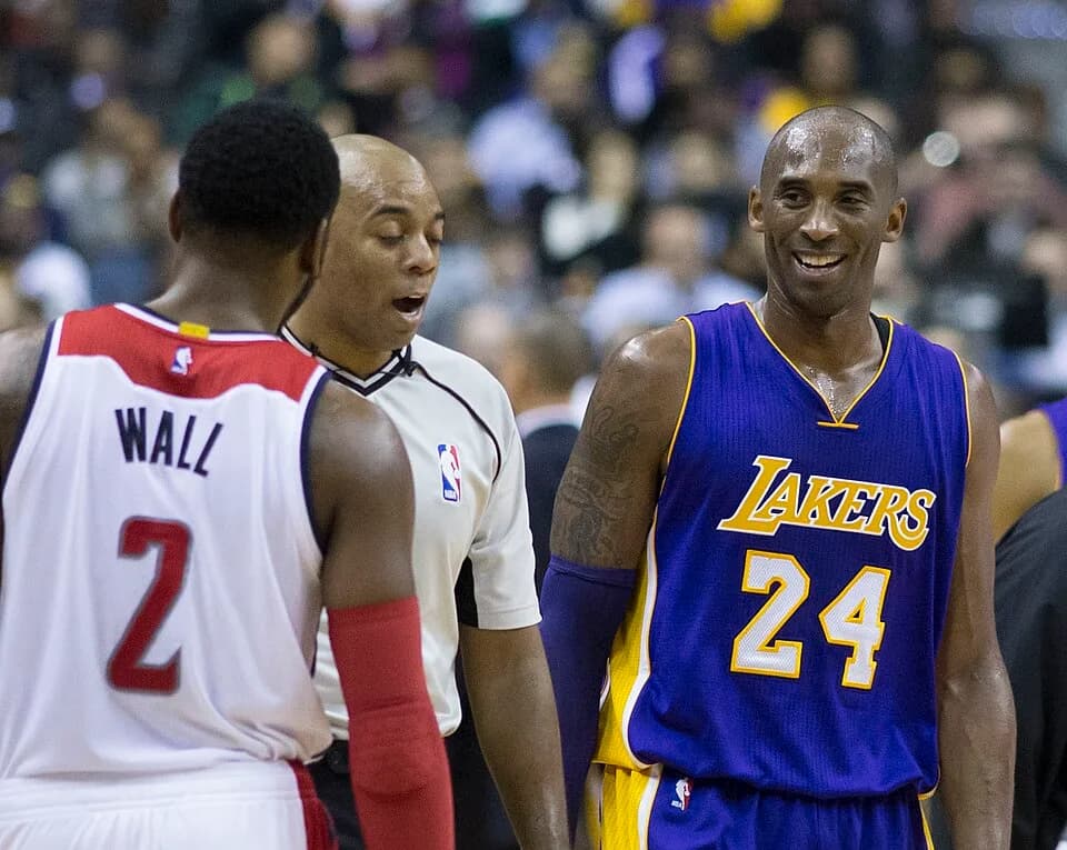 Kobe Bryant - Kobe Bryant of Los Angeles Lakers with John Wall of Washington Wizards
