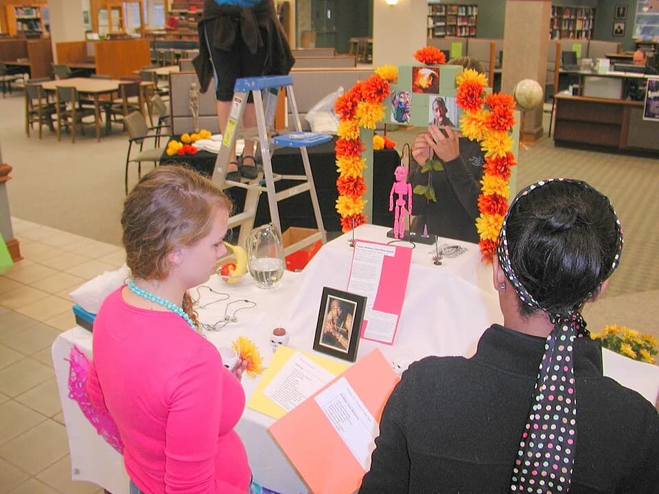 Tupac Shakur - A student groups works on the altar dedicated to Tupac Shakur.