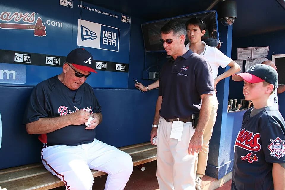 Bobby Cox - Atlanta Braves Manager Bobby Cox autographs a baseball for Army Astronaut Shane Kimbrough and his son Zack before a home game against the Boston Red Sox at Turner Field June 26. 




This 