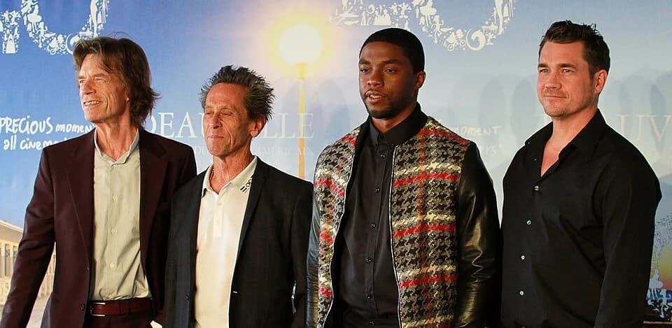 Chadwick Boseman - 2014 Deauville American Film Festival (France) - September 12, 2014. From left to right: Mick Jagger, Brian Grazer, Chadwick Boseman and Tate Taylor for the movie Get on Up.