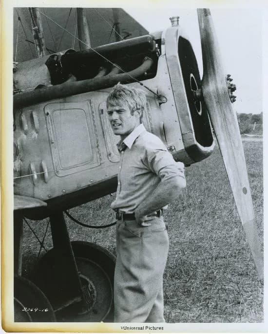 Robert Redford - Robert Redford in the film The Great Waldo Pepper (1975).
Catalog #: Movie-7
Notes: 
Photo of Waldo Pepper (Robert Redford) surveying the crowd that has gathered to watch his stunt ex
