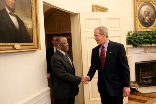 Festus Mogae - Meeting with the leaders from Mozambique, Botswana, Niger, Ghana and Namibia, President George W. Bush welcomes President Festus Mogae of Botswana to the Oval Office Monday, June 13, 20