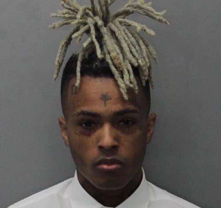 XXXTentacion XXXTentacion - A mugshot of Jahseh Onfroy, better known as rapper XXXTentacion, after being arrested for seven felony charges related to his 2016 domestic violence case, including witness