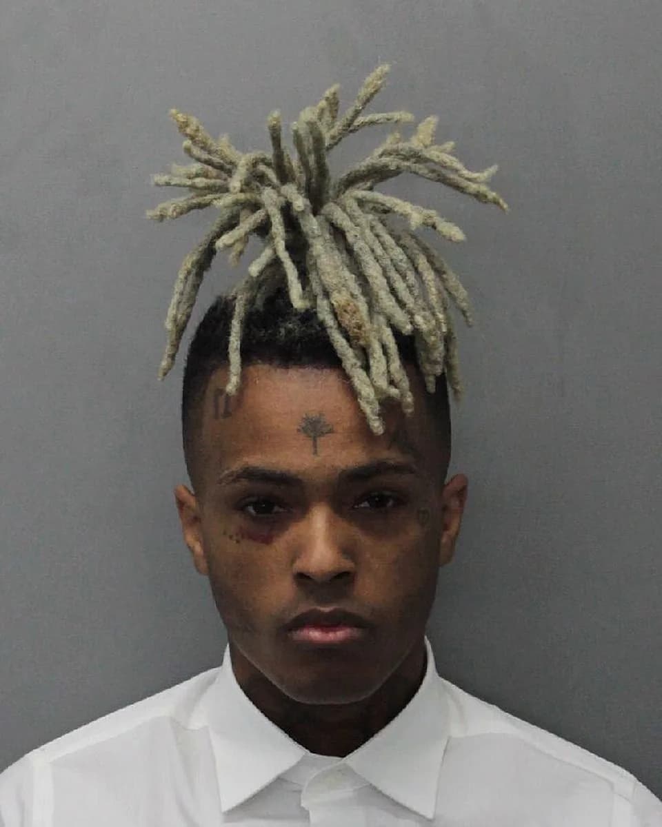 XXXTentacion XXXTentacion - This is a mugshot of rapper XXXTentacion after being taken into pre-trial custody on December 15, 2017.Best quality available) In this handout provided by the Miami Dade Co
