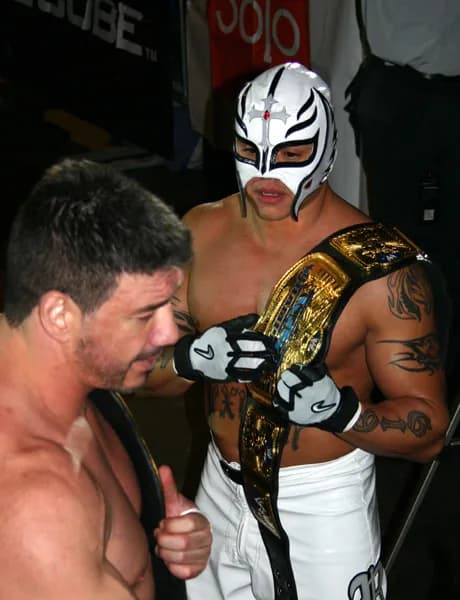 Eddie Guerrero - Rey Mysterio and Eddie Guerrero after trying to steal the WWE tag Team Championships from then Champs (The Basham Brothers) during a WWE house show held in Kitchener, Ontario, Canada 
