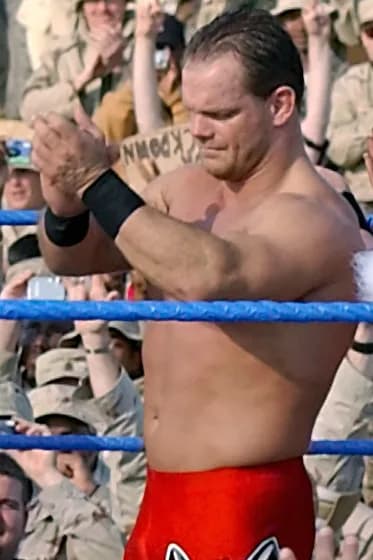 Chris Benoit - Chris Benoit, one of the World Wrestling Entertainment (WWE) superstars performing for the Coalition troops at Camp Victory, Baghdad International Airport (BIAP), Iraq (IRQ) during Oper