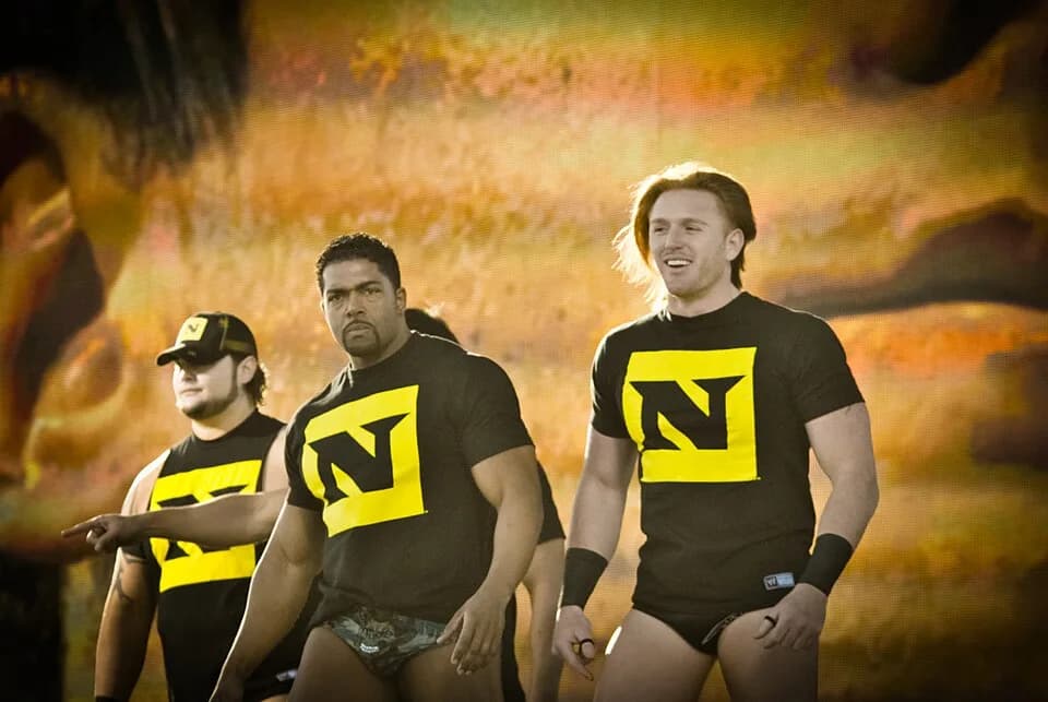Bray Wyatt - From left to right: Husky Harris, David Otunga, and Heath Slater at WWE's 2010 Tribute to the Troops show in Fort Hood, Texas, in December 2010.