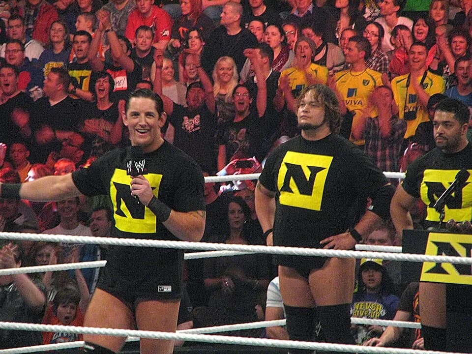 Bray Wyatt - Wade Barrett (left), Husky Harris (center), and David Otunga (right).