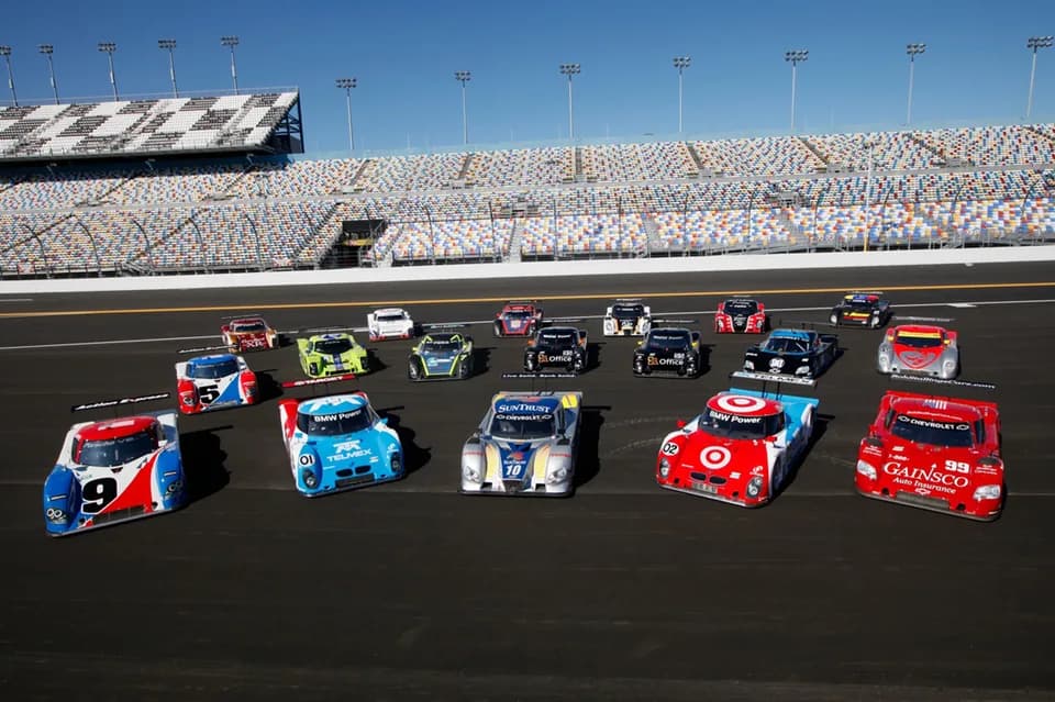 Justin Wilson - A collection of Daytona Prototype sports cars pose for the camera during the lead-up to the 2011 Rolex 24 at Daytona (24 Hours of Daytona) endurance race. The #01, second from the left