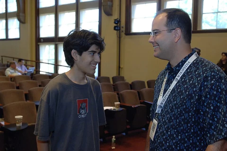 Aaron Swartz - Aaron Swartz shares a laugh with Interim Executive Director Brad Patrick at Wikimania 2006.