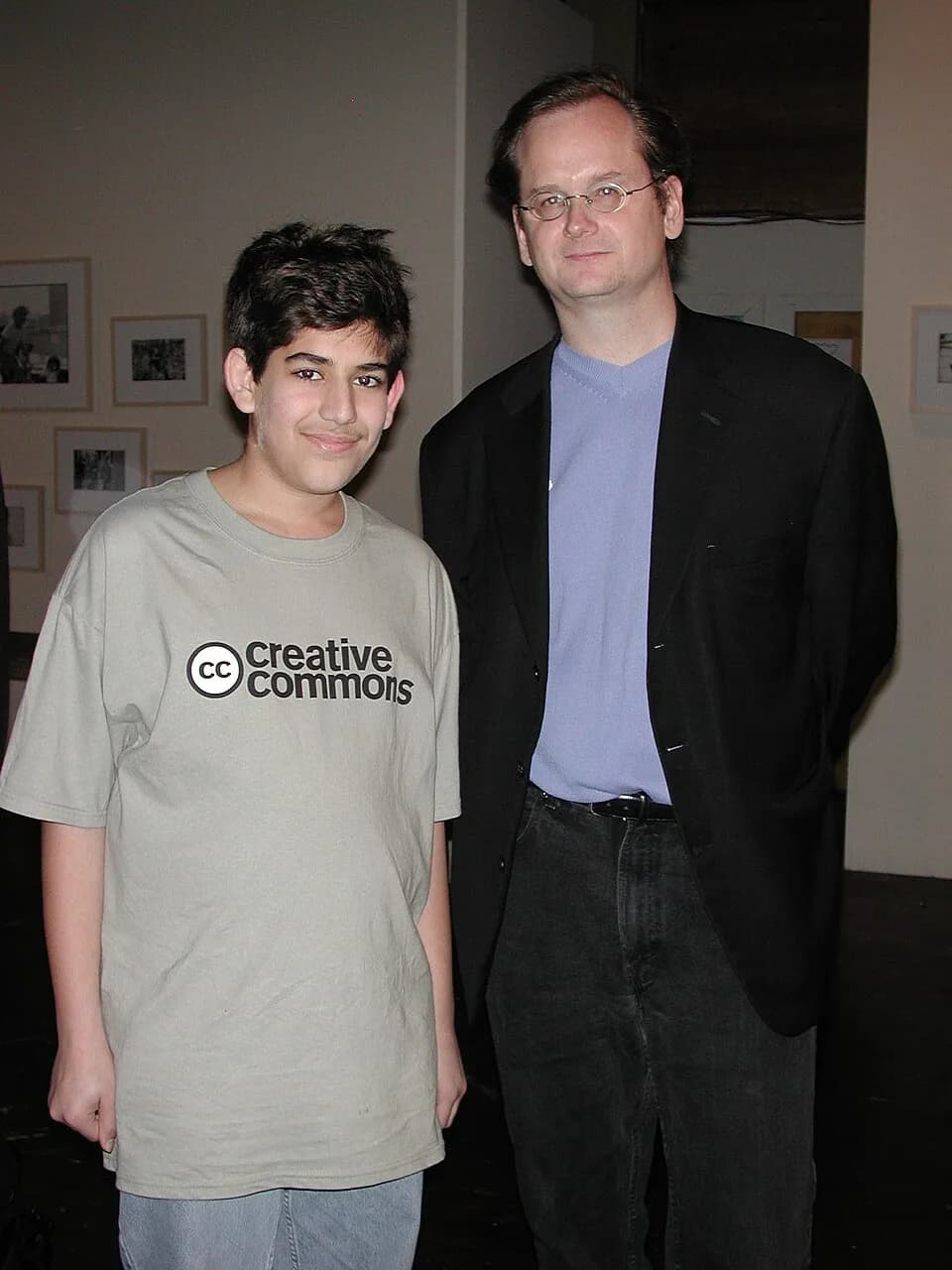 Aaron Swartz - Aaron Swartz (age: 16)
and Lawrence Lessig at the Creative Commons launch party in December 2002.