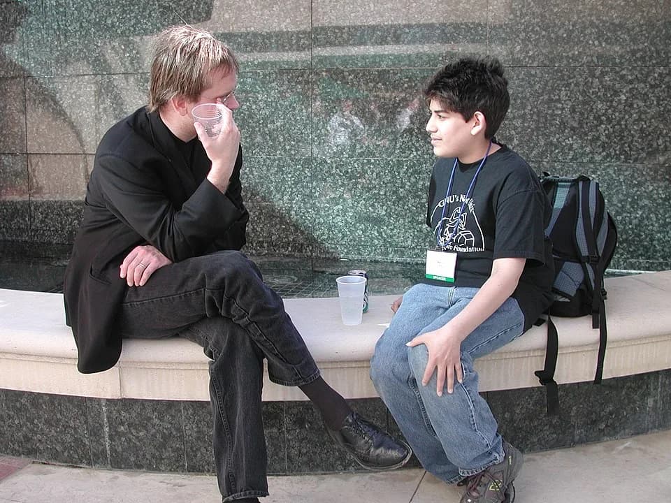Aaron Swartz - Photo of Lawrence Lessig and Aaron Swartz at the launch party for Creative Commons at O'Reilly's Emerging Technology Conference.