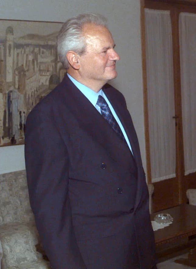 Slobodan Milošević - Serbian President Slobodan Milosevic attending a meeting in Belgrade with Admiral T. Joseph Lopez, US Navy, Allied Forces Southern Europe, United States Naval Forces Europe and Co