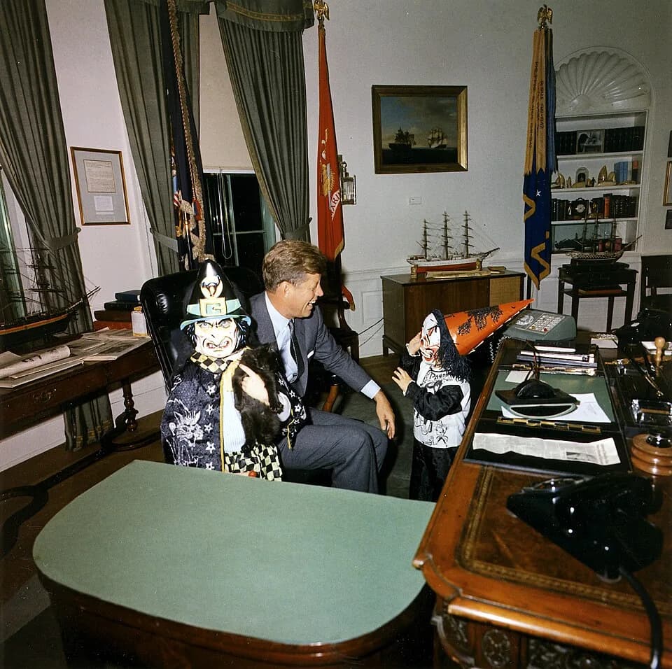 John F. Kennedy Jr. - "Halloween visitors with the President, 31 October 1963" US President John F. Kennedy with his two children in Halloween costumes. President Kennedy, John F. Kennedy Jr., Carolin