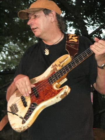 Stevie Ray Vaughan - Tommy Shannon at Blues on the Green in Austin, TX (2006). Photo by Ron Baker.