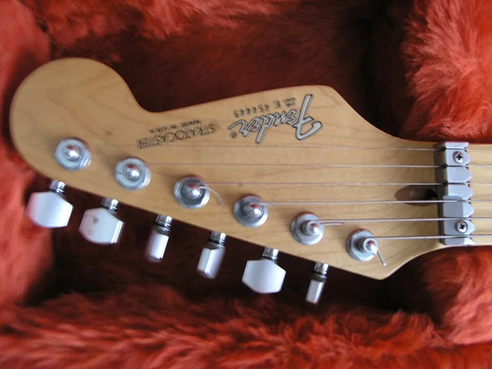 River Phoenix - Sky Phoenix (aka George Siewierski) guitar used as Alekas Attic backup guitar by River Phoenix mostly used on the song by Josh McKay "Gold Mine" Close up of Yellow Fender American Stra