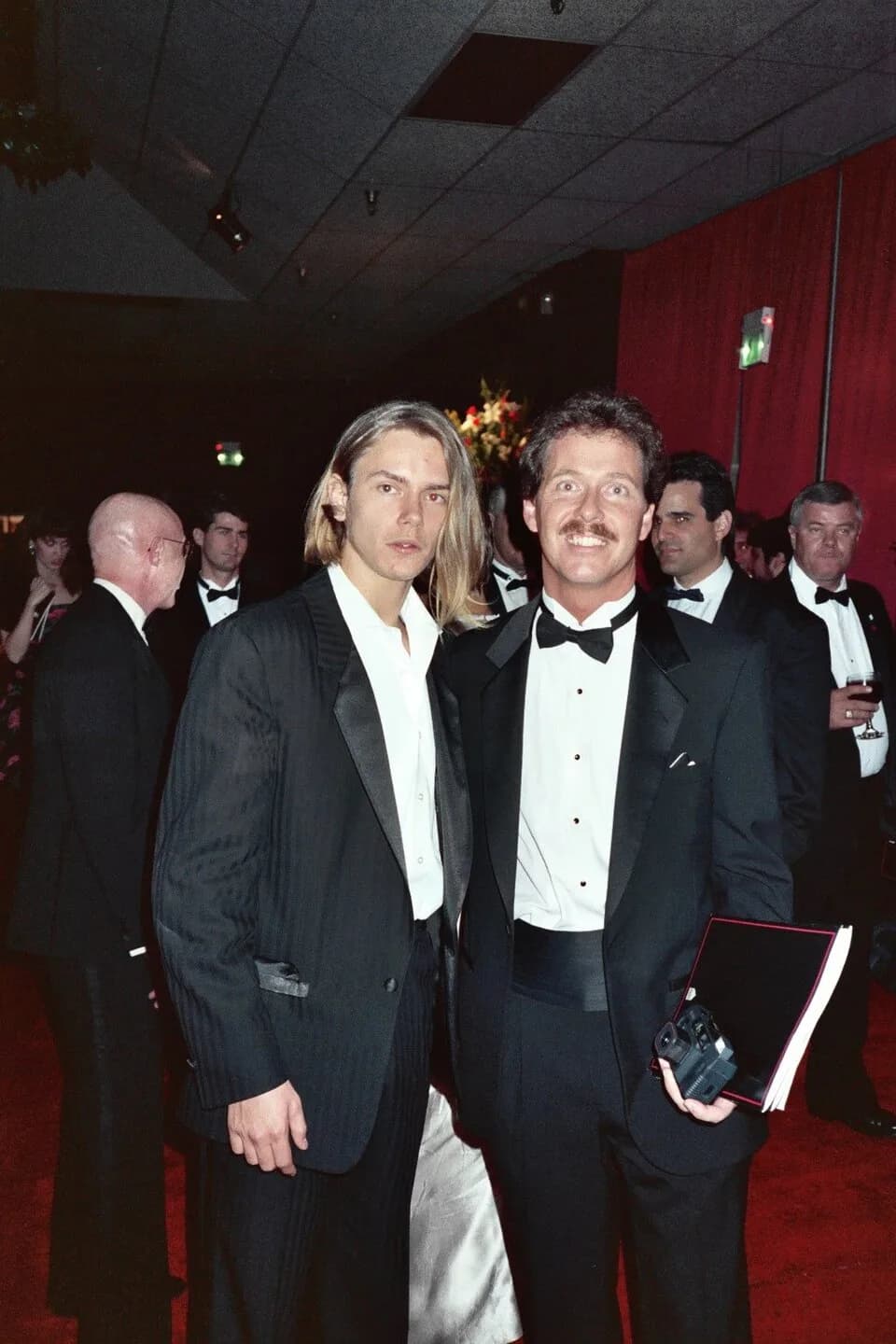 River Phoenix - River Phoenix (August 23, 1970 – October 31, 1993) poses with Rick Best at the Governor's Ball following the telecast of the 61st Annual Academy Awards, March 28, 1989.
NOTE: Permissio