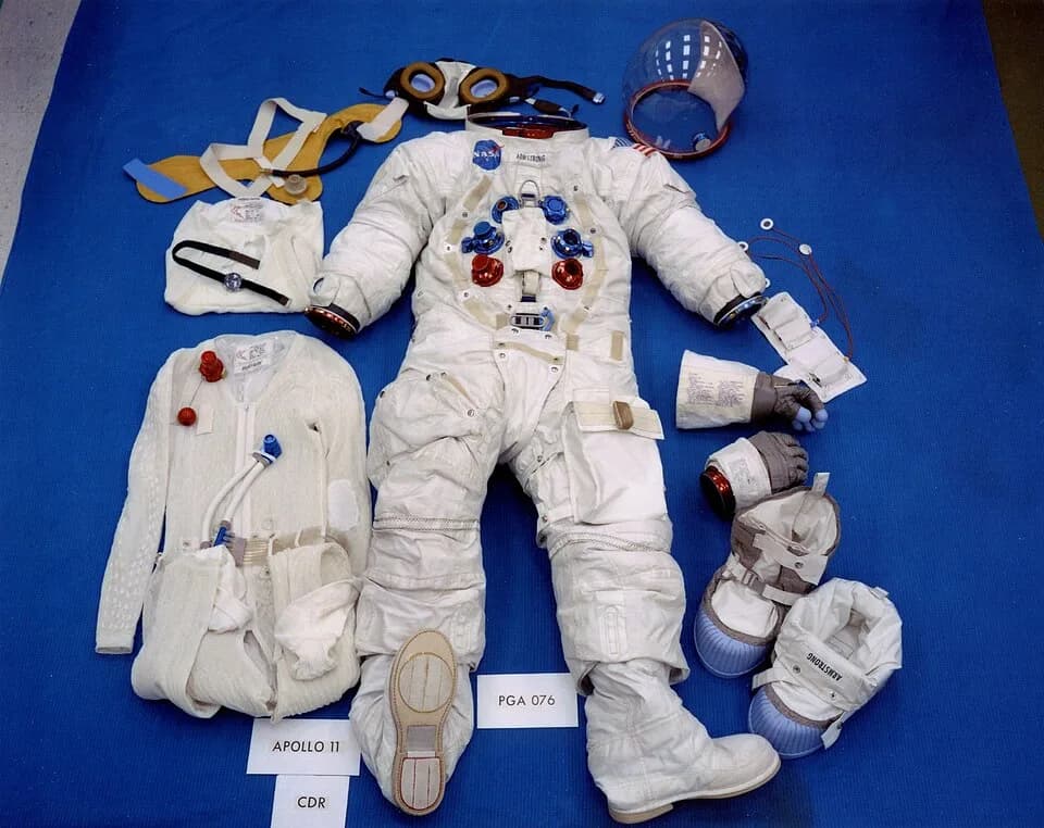 Neil Armstrong - Neil Armstrong's Apollo 11 EMU displayed on a table top before the mission was flown.