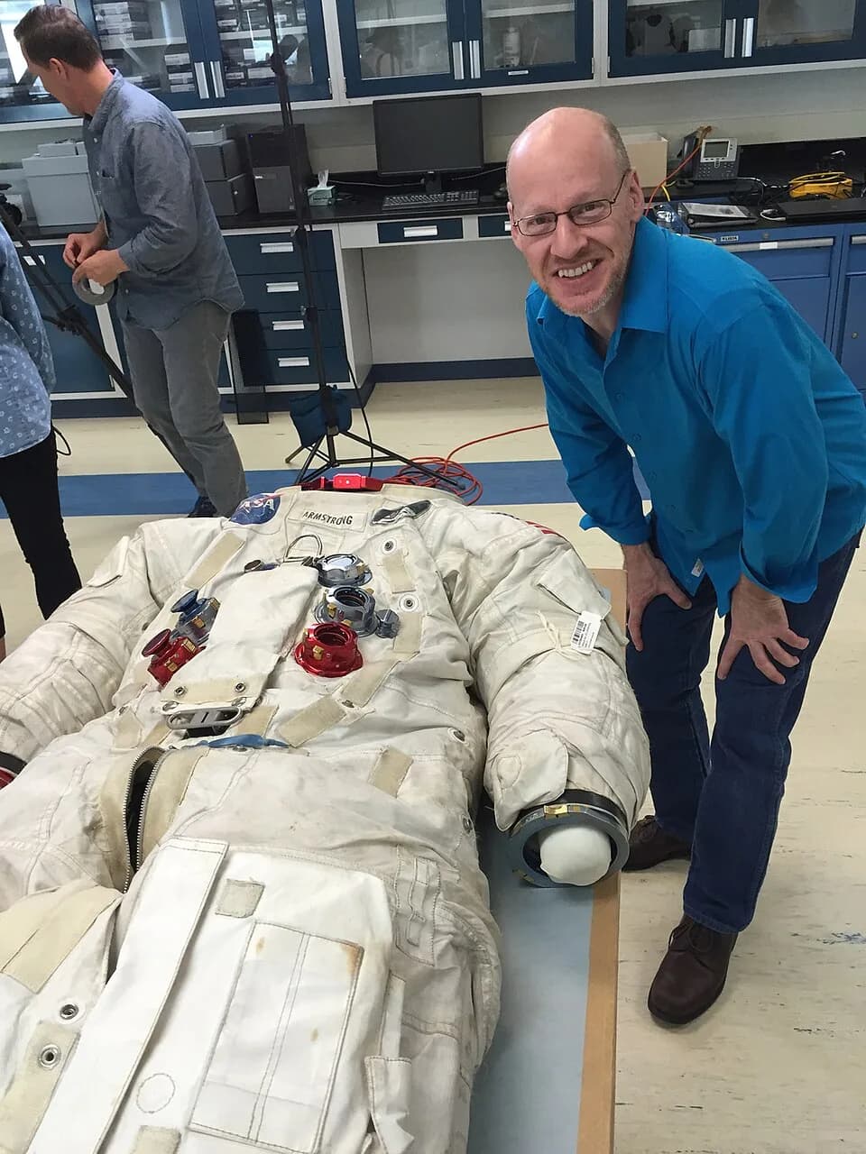 Neil Armstrong - A photo of astronomer Phil Plait posing next to Neil Armstrong's Apollo 11 spacesuit at the Smithsonian's Udvar-Hazy Center.
