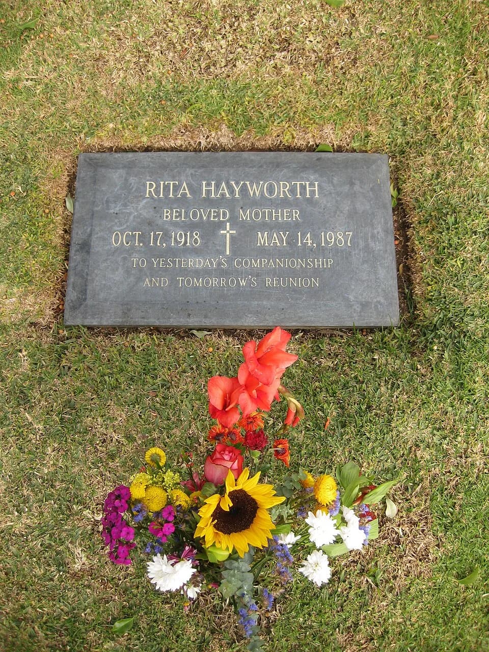 Rita Hayworth - Grave of film actress and dancer Rita Hayworth at Holy Cross Cemetery in Culver City, California (grotto, lot 196, grave 6). Hayworth was born Margarita Carmen Cansino on October 17, 1