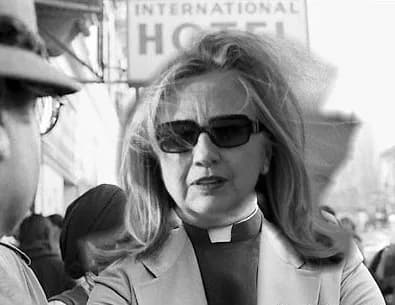 Jim Jones - Bad example of frame grab from online news website of Reverend Jim Jones with head of Hilary Clinton photoshopped over it.  Original photo by Nancy Wong of Jones in 1977 that was special t
