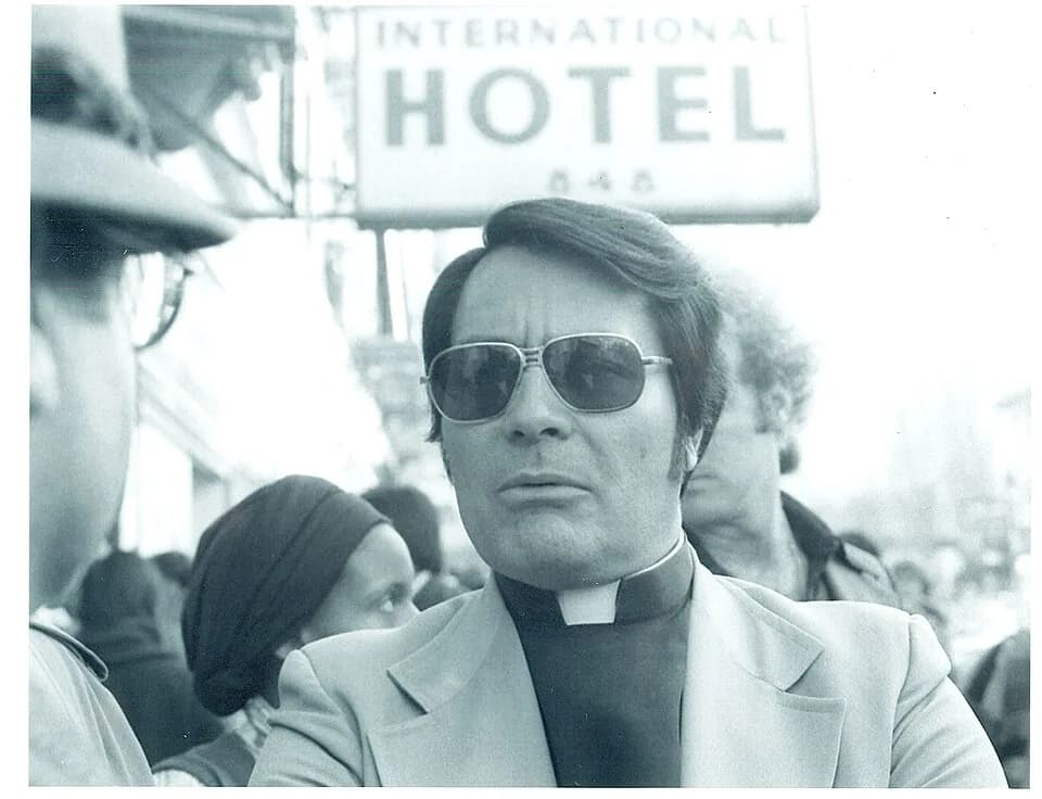 Jim Jones - Rev. Jim Jones at an anti-eviction rally Sunday, January 16, 1977 in front of the International Hotel, Kearny and Jackson Streets, San Francisco Photo by Nancy Wong