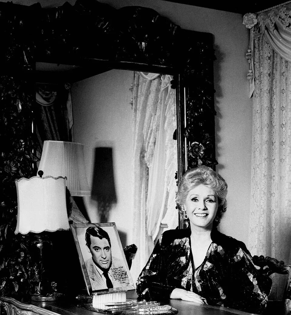 Debbie Reynolds - Debbie Reynolds taken in her bedroom in California. Hassleblad 500.  80mm lens. 400asa Kodak black &amp; white negative film. 2000 jewel. light bowens flash pack with umbrellas