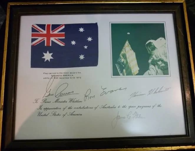 Gough Whitlam - The Australian flag flown on the final mission of the Apollo program, which took place from 6 - 19 December 1972. The framed specimen forms part of the Whitlam Institute collection and