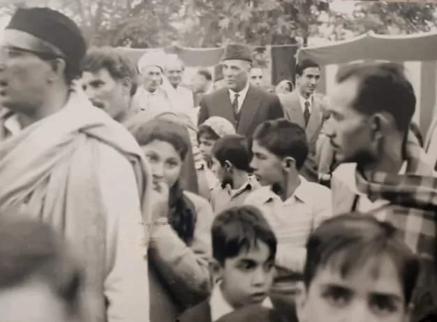 Nusrat Fateh Ali Khan - Wajid Ali Khan Burki at a winter wedding in 1961 in Jalandhar, India. Nusrat Fateh Ali Khan is also seen in the photo biting his thumb.