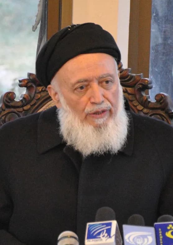 Burhanuddin Rabbani - Cropped photograph of Burhanuddin Rabbani. 
Professor Burhanuddin Rabbani, chairman of Afghanistan’s High Council for Peace, rights, addresses the media with Nangarhar Gov. Gul A