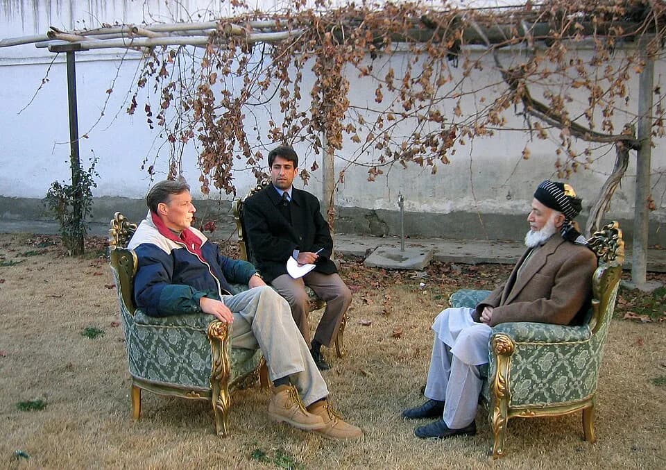 Burhanuddin Rabbani - Rabbani is being interviewed for German TV by Armin-Paul Hampel, Kabul, 2003