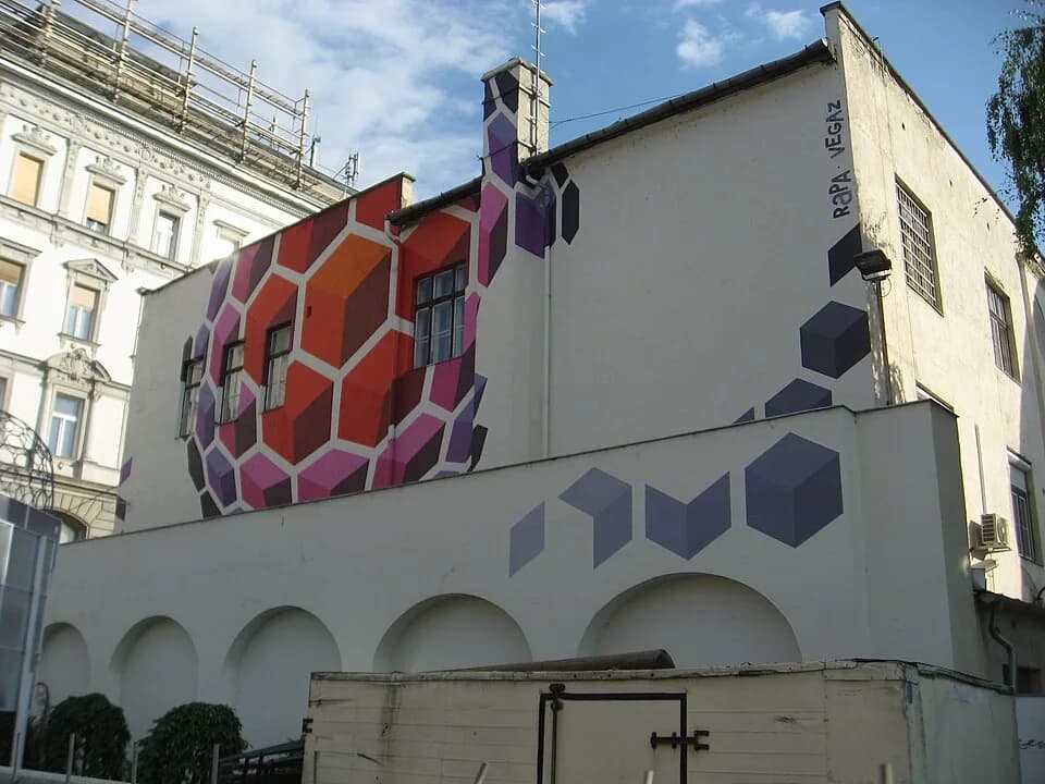 Victor Vasarely - 'In honor of Victor Vasarely' by 'Színes Város Csoport' creative group (2010 works, destroyed/repainted with other mural in 2019) on the north facade of Budapest's downtown (District