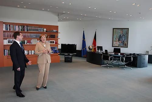 Oskar Kokoschka - Angela Merkel with Dmitry Medvedev in her office in the Federal Chancellery, Berlin. The painting above her desk is of Konrad Adenauer by Oskar Kokoschkas.