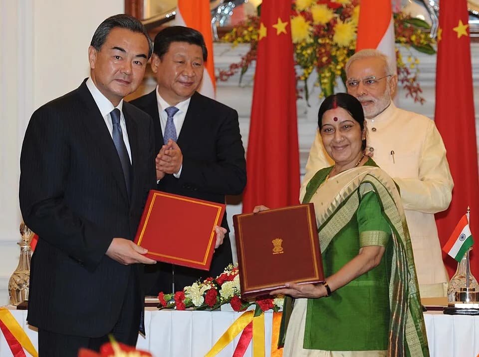 Sushma Swaraj - In New Delhi on September 18, 2014, the Prime Minister, Narendra Modi and the Chinese President, Xi Jinping witnessing the signing of an memorandum of understanding between their forei