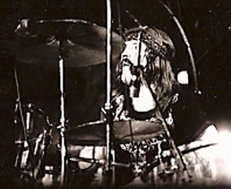John Bonham - A cropped and despeckled version of a picture of John Bonham of Led Zeppelin playing with the band in at Madison Sq Garden or Nassau Coliseu c. 1973
