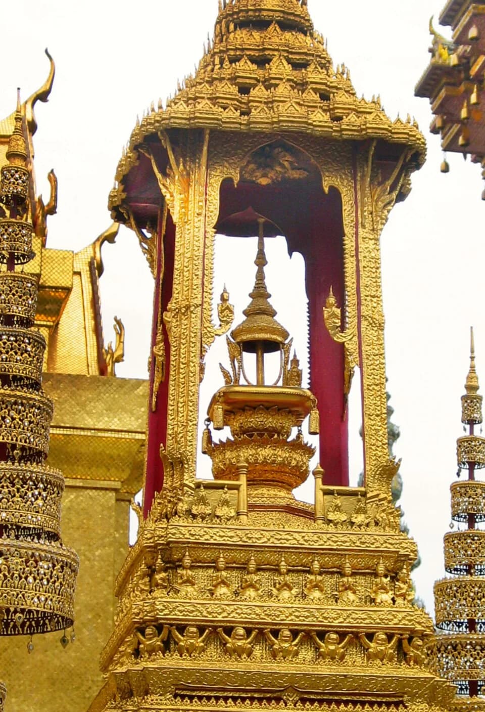 Mongkut - Monument (busabok) with insignia of King Rama IV within Wat Phra Kaew (Bangkok, Thailand), showing a Thai crown with ear ornaments (mongkut).