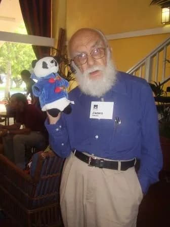 James Randi - James Randi holding a stuffed panda.