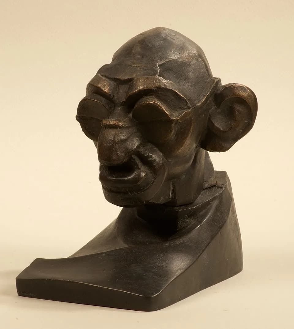 Józef Gosławski - Caricature of Mohandas Karamchand Gandhi, designed in 1932 by Józef Gosławski (casting made in bronce in 2007).