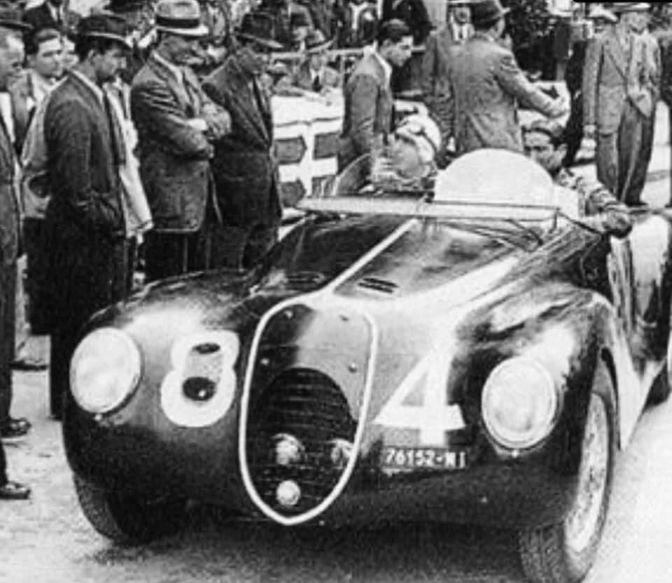 Giuseppe Farina - Giuseppe Farina and co-driver Paride Mambelli rests in Alfa Romeo 6C 2500 SS Torpedino Brescia at Mille Miglia on 28 Aprile 1940
