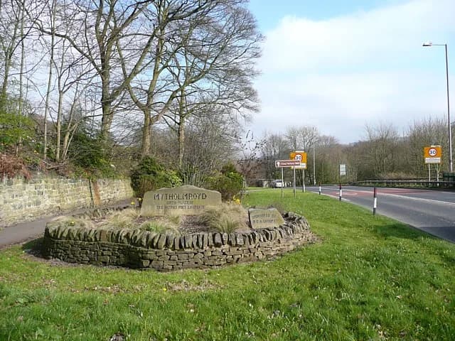 Ted Hughes - Mytholmroyd boundary stone, Burnley Road A646 Commemorating the poet Ted Hughes. 'Mytholmroyd / birth place of / Ted Hughes Poet Laureate', and a stone inscribed 'Sponsored by BCA Group L