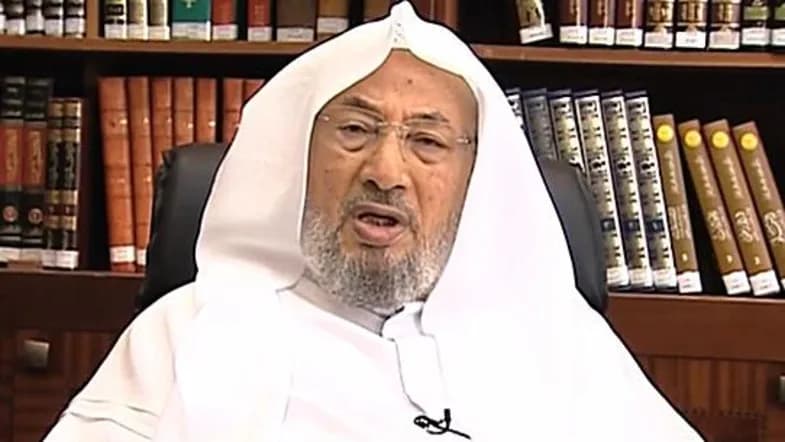 Yusuf al-Qaradawi - Sheikh Qaradawi talking to a group of people